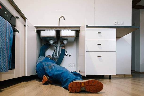 Professional Emergency Plumber technician working in Auburn, IL